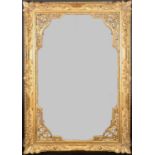 Alexander G Ley & Son. A Reproduction Carved Giltwood Venetian Panelled Frame, with inset mirror