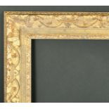Alexander G Ley & Son. A Reproduction English Carved Giltwood Running Pattern Frame, rebate 50" x