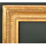 19th Century French School. A Gilt Composition Fluted Empire Frame, circa 1840, rebate 26" x 20.
