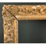 Late 18th Century French School. A Carved Giltwood Regence Frame, with ornate centres and corners,