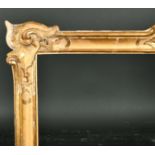 18th Century French School. A Carved Giltwood Asymmetrical Carved Frame, with swept centres and