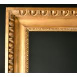 18th Century Italian School. A Neoclassical Carved Giltwood Hollow Frame, rebate 72" x 40.5" (183