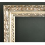 18th Century Italian School. A Carved Wood Silver Frame, circa 1730, rebate 30" x 26.5" (76.2 x 67.