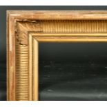 Early 19th Century French School. A Gilt Composition Fluted Empire Frame, rebate 34" x 29.5" (86.4 x