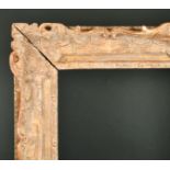 Early 18th Century French School. A Louis XV Carved Giltwood Frame, with swept and pierced centres