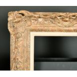 20th Century English School. A Gilt and Painted Composition Frame, with swept and pierced centres