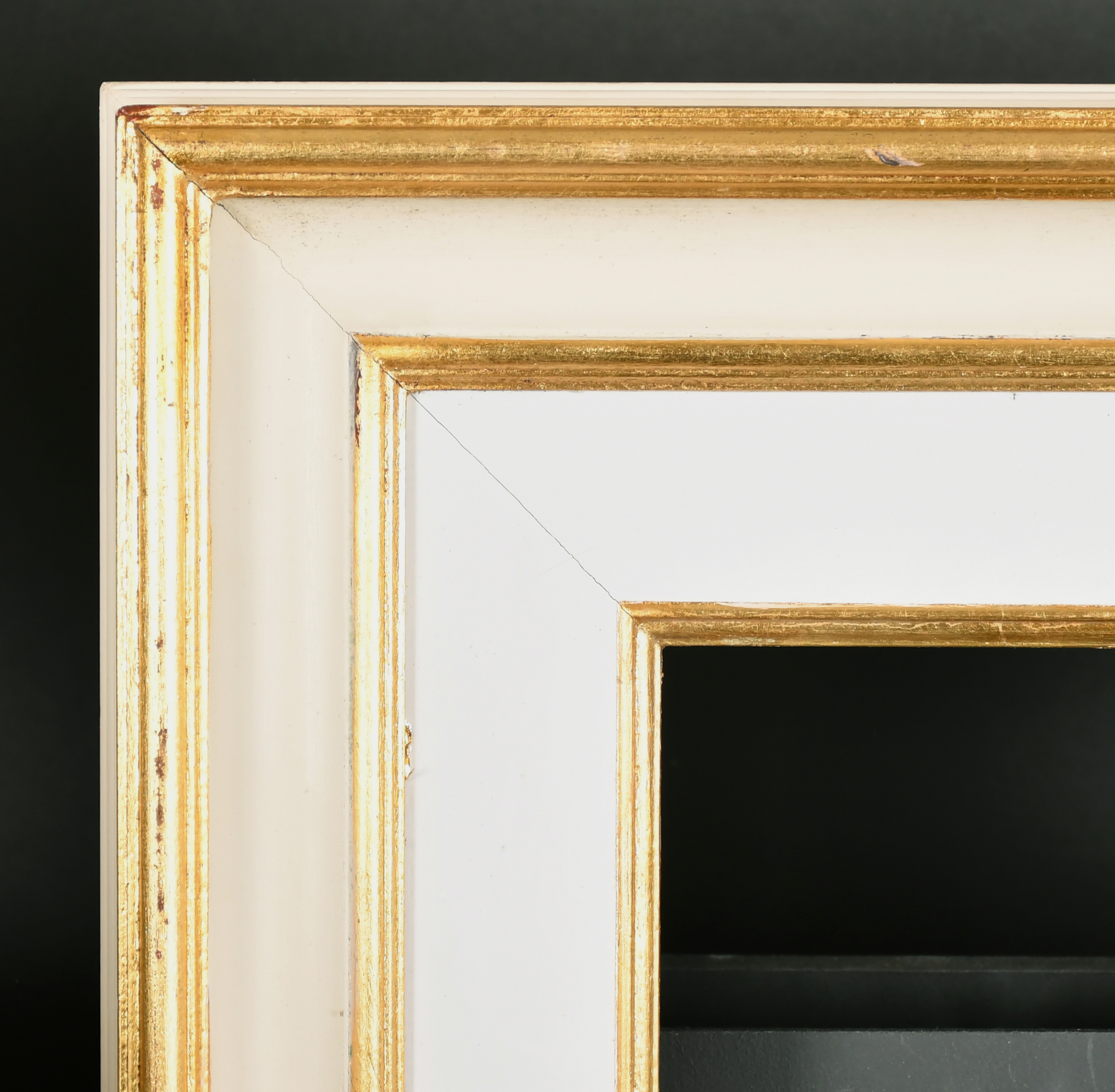 21st Century English School. A Gilt and White Painted Frame, rebate 18" x 10" (45.7 x 25.4cm)