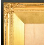 19th Century English School. A Gilt Composition Frame with swept centres and corners and inset