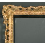 20th Century English School. A Gilt and Painted Composition Frame, with swept and pierced centres