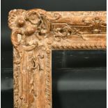 Early 20th Century French School. A Gilt Composition Frame, with swept and pierced centres and