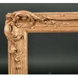 20th Century English School. A Gilt Composition Frame with swept and pierced centres and corners,