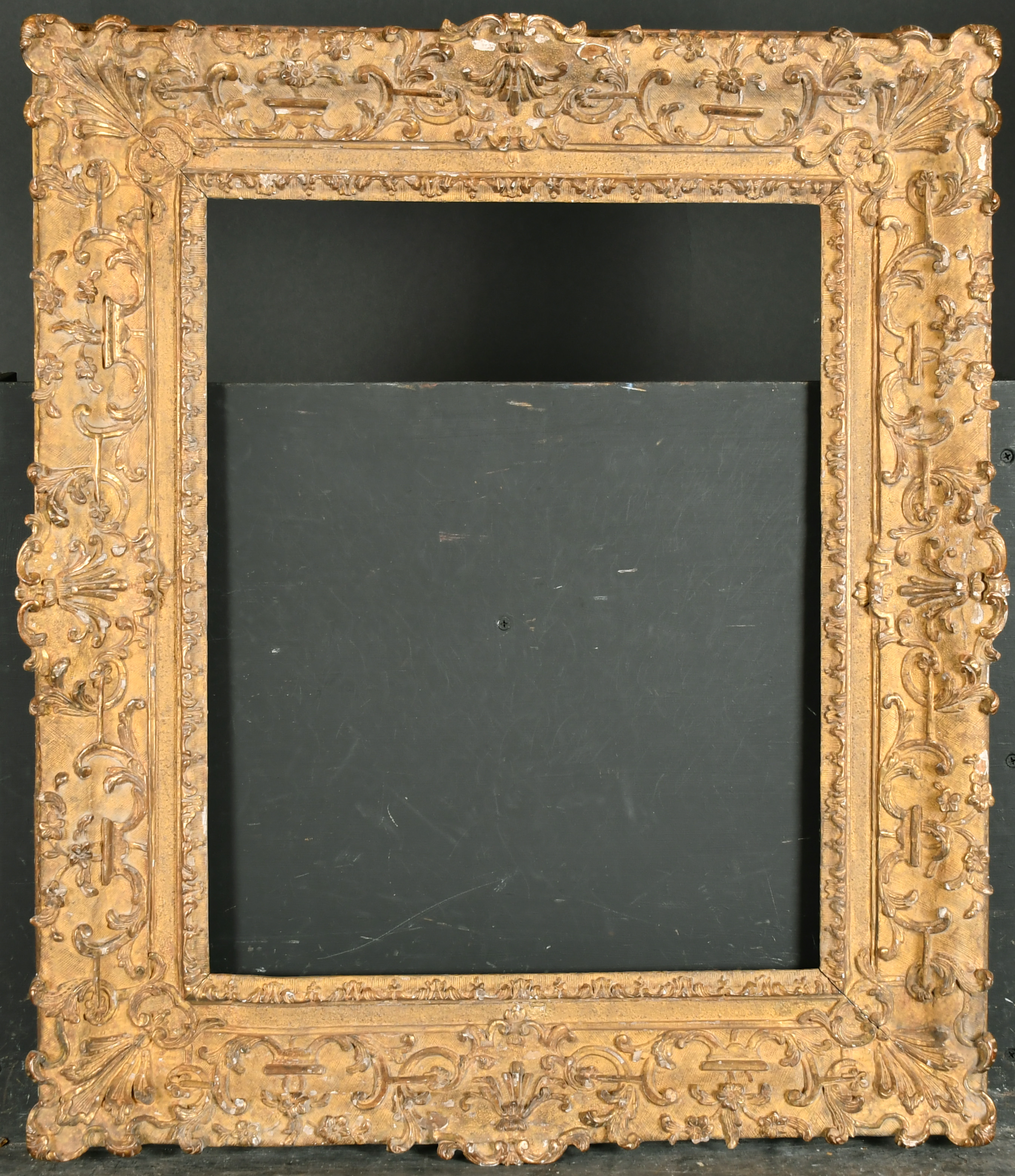 18th Century French School. A Regence Carved Giltwood Frame, with swept centres and corners, - Image 2 of 3