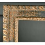 17th Century Italian School. A Gilt and Painted Cassetta Frame, rebate 70" x 58" (178 x 147.3cm)