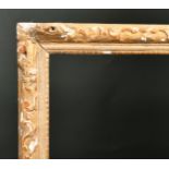 17th Century French School. A Carved Giltwood Louis XIII Frame with swept corners, rebate 35" x 27.