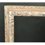 Late 17th Century English School. A Silver Carved Wood Lely Panel Frame, rebate 38" x 28.5" (96.5
