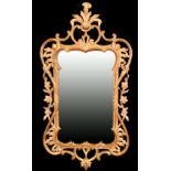 20th Century English School. A Carved Giltwood Chippendale Style Frame, with inset mirror glass,