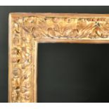 Early 18th Century French School. A Carved Giltwood Reverse Leaf Frame, rebate 50.5" x 25" (128.3