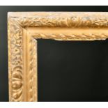 17th Century English School. A Carved Giltwood Lely Finger Panel Frame, rebate 30" x 24.5" (76.2 x