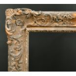 19th Century English School. A Carved Giltwood Frame, with swept corners, rebate 30.5" x 25" (77.5 x