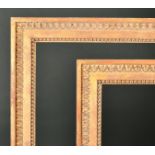 Alexander G Ley & Son. A Pair of Reproduction Carved Giltwood Baguette Frames, rebate 57.25" x 21.