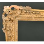 18th Century English School. A Carved Giltwood Frame with swept and pierced centres and corners,