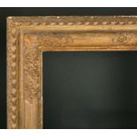 Late 18th Century English School. A Craved Giltwood Frame, with Lely panels, rebate 31" x 24.5" (