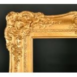 19th Century English School. A Gilt Composition Frame with swept centres and corners, rebate 25.5" x