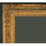 19th Century English School. A Gilt Composition Frame, with swept and pierced centres and corners,