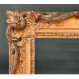 Early 19th Century English School. A Carved Giltwood Frame, with swept and pierced centres and