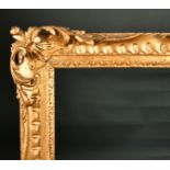 18th Century English School. A Carved Giltwood Frame, with swept and pierced centres and corners,