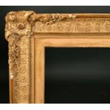 19th Century English School. A Gilt Composition Frame, with swept corners, rebate 39.5" x 32" (100.3