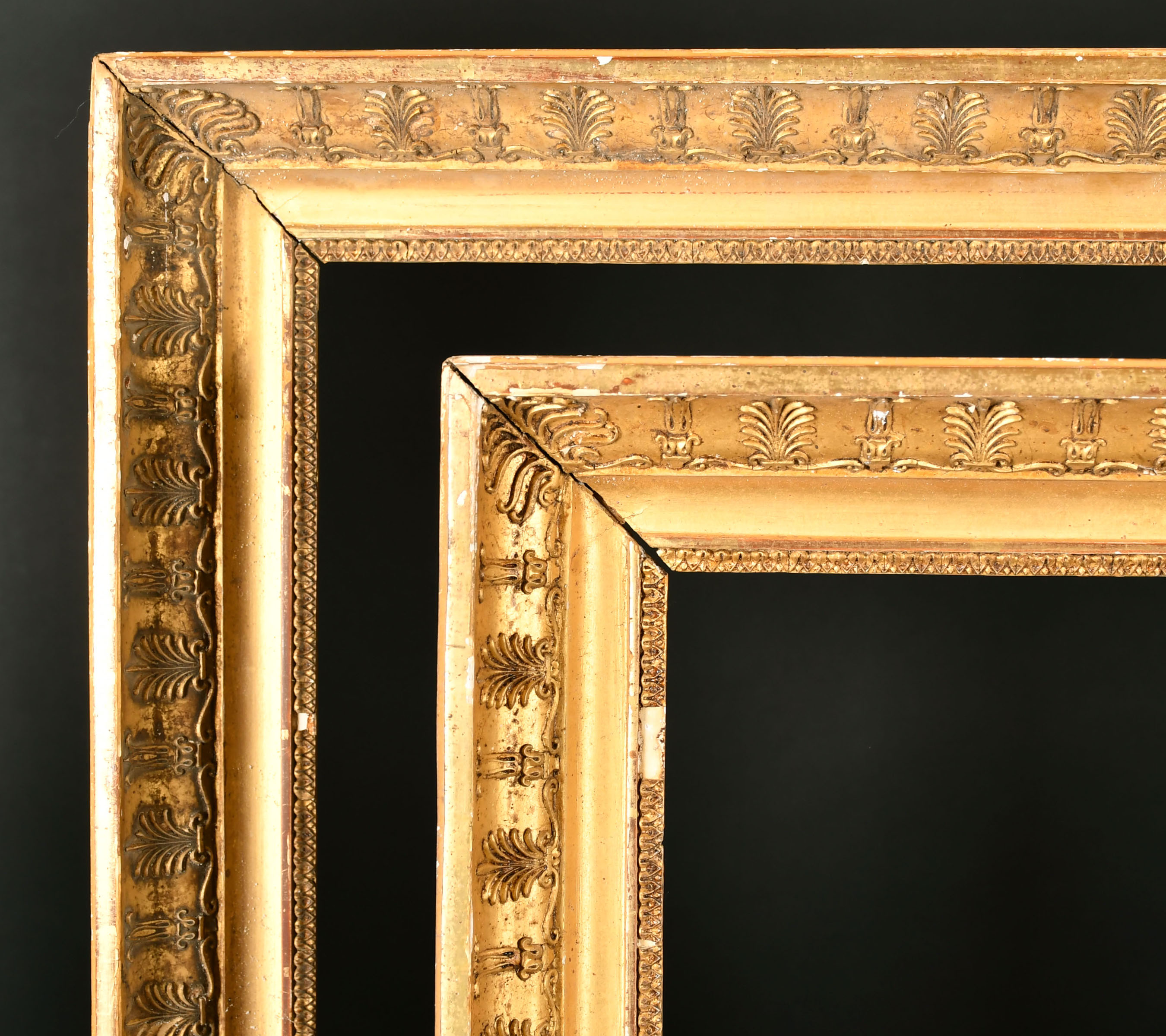 19th Century French School. A Near Pair of Empire Gilt Composition Frames, rebate 28" x 24" (71.1