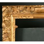 18th Century French School. A Carved Giltwood and Painted Louis Frame, rebate 19" x 15" (48.2 x 38.