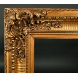 19th Century European School. A Gilt Composition Frame, with swept corners, rebate 40" x 26" (101.