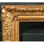 19th Century English School. A Gilt Composition Frame, with swept centres and corners, rebate 29.75"