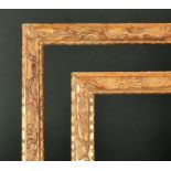 19th Century French School. A Pair of Carved Giltwood Frames, rebate 23" x 18.5" (58.4 x 47cm)
