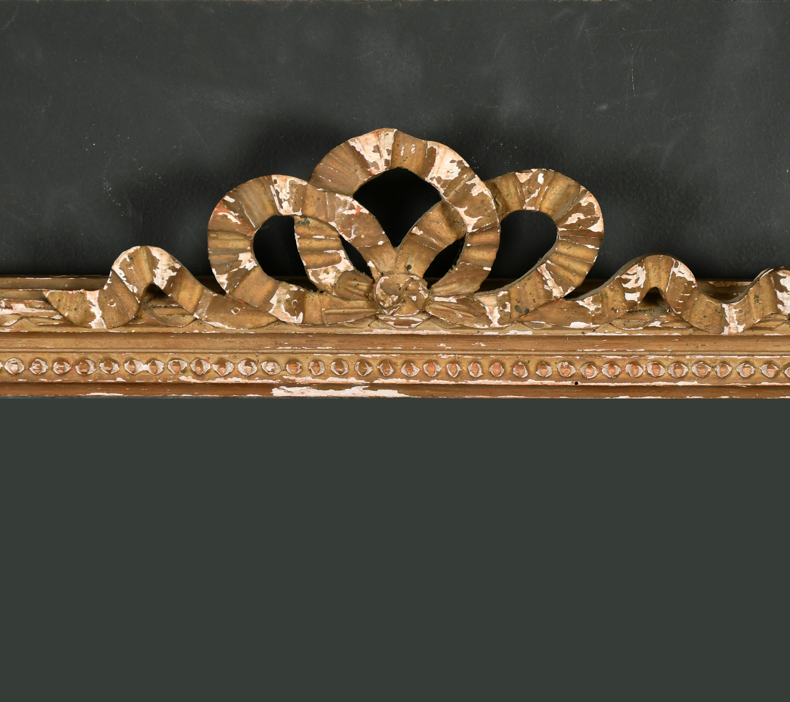 19th Century French School. A Carved Giltwood Frame, with ornate pediment, with inset glass,