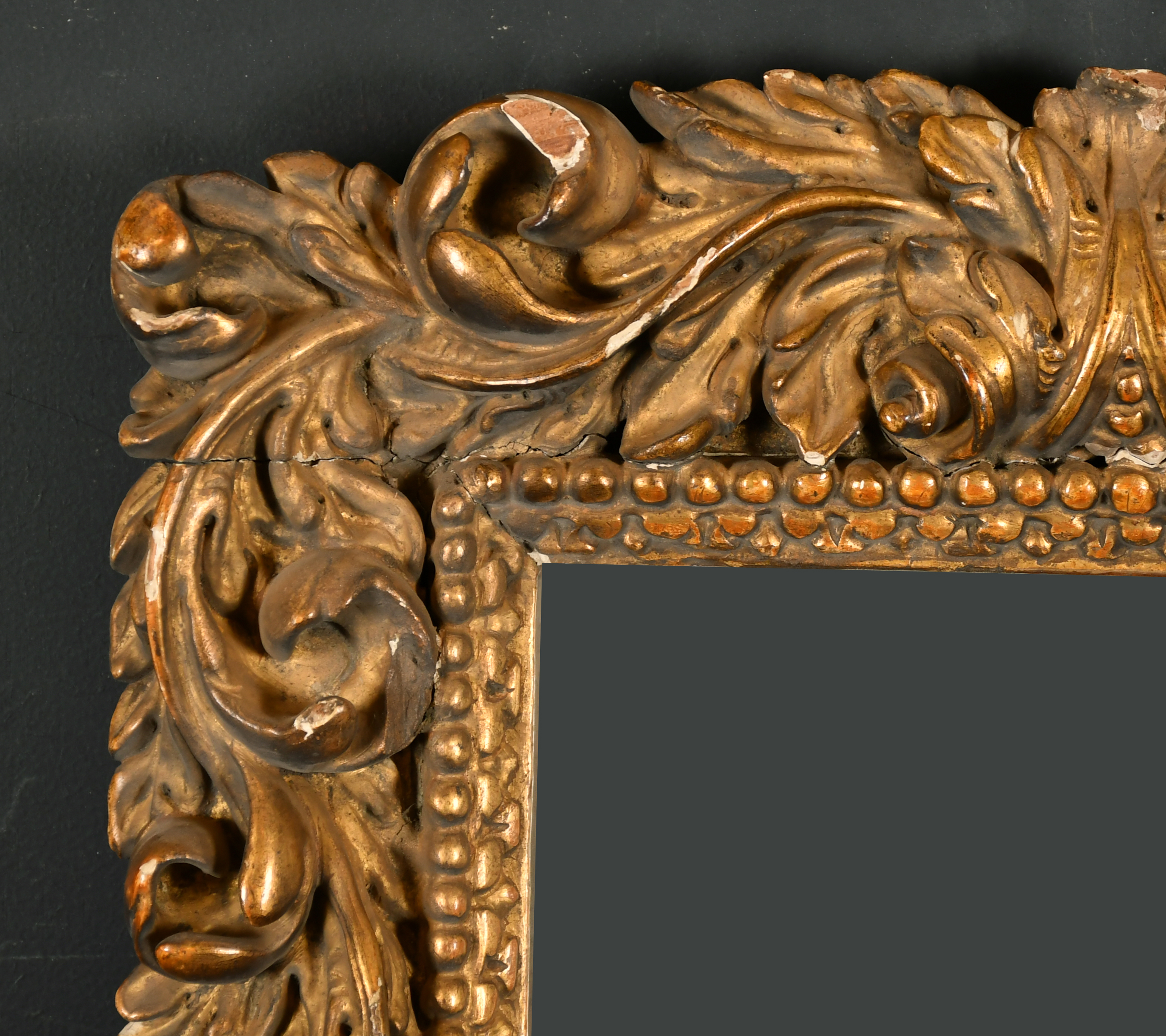 19th Century European School. A Carved Giltwood Frame, with inset mirror glass, rebate 10.75" x 8.