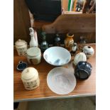 Lot of studio pottery , 3 whisky decanters etc .