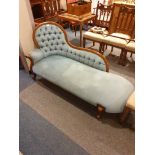 Ornate button back chaise lounger.