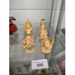 Lot of oriental small buddha figures .