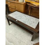 Quality Heavy wood coffee table with marble insert .