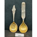 2 ornate silver Norwegian spoons with gilt finish . 68 grams .