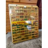 Large original matchbox display cabinet with 77 match box vehicles .