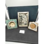 2 silver photo frames together with vintage mirror .