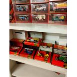 Shelf of matchbox steam rollers , vans etc all boxed.