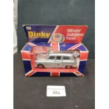 Boxed dinky 241 silver jubilee taxi .