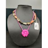 Pink jade necklace together with agate style necklace.