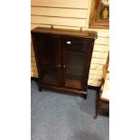 Lovely Stag Glassed 2 door Bookshelf with brass know handles and glass shelves 80 cms length 25