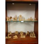 Lot of 18 oriental wooden figures and displays includes Pagoda building , rickshaw etc together with